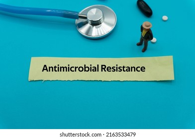 Antimicrobial Resistance.The word is written on a slip of colored paper. health terms, health care words, medical terminology. wellness Buzzwords. disease acronyms.