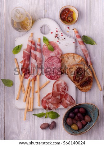 Anti-pasta. grissini with prosciutto Stock photo © 