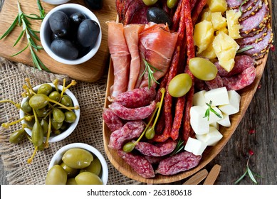 Antipasti And Catering Platter With Different Meat And Cheese Products