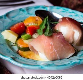 Antipasti On Ceramic Plate At Italian  Restaurant On  Amalfi Coast.