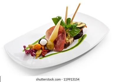 Antipasto - Italian Meal. Includes Cured Meat, Artichoke, Parmesan Cheese, Olives And Zucchini