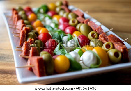 Similar – Image, Stock Photo Tomato mozzarella skewers with basil