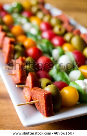 Similar – Image, Stock Photo Tomato mozzarella skewers with basil