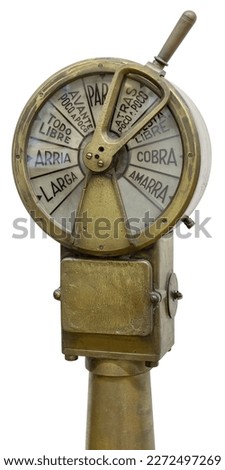Antique 19th century spanish engine room telegraph isolated on white background
