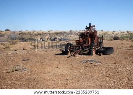 Antique abandoned farm machinery - harvester and baler for lucerne on farm in Bushmanland South Africa