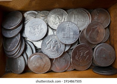 Antique American Money On A Junk Dealer's Tray, In A Wooden Box.
One Dollar Coins, The Legend Of World Monetary Culture. USA, The World Currency.