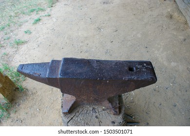 antique anvil hammer. 19th century vintage iron anvil