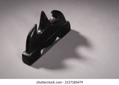 An Antique Black Chinese Calligraphy Pen Holder On A Gray Background