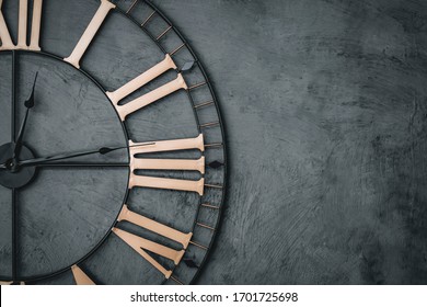 Antique black antique metal clock with Roman numerals