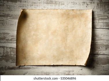 Antique Blank Parchment On Aged Wooden Wall