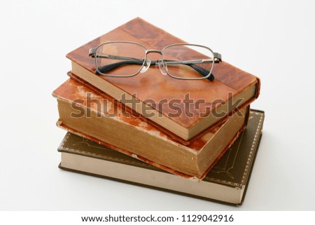Antique books and glasses