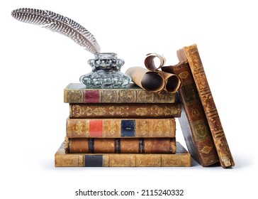 Antique books, inkwell with quill pen and old scrolls on white background 