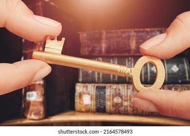 Antique Bronze Key On Books Background