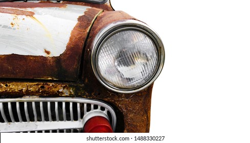 Antique Cars With Rust. Detail Of The Front Headlight Of An Old Car Isolated On White Background.  Front Of A Rusty Old And Retro Looking Light Car On White.