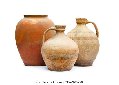 Antique ceramic decorative amphora on a white background. Clay jugs and a pot, a set of ancient utensils for drinking wine, water or milk. - Shutterstock ID 2196395729