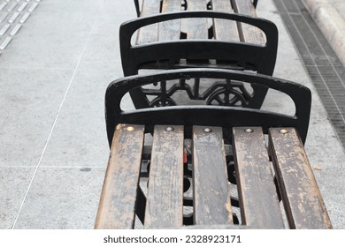 Antique city garden chairs in wood and iron combination - Shutterstock ID 2328923171