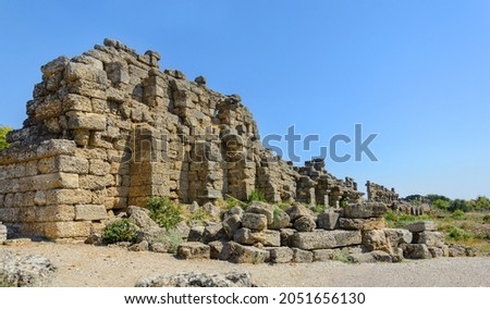 Antique city walls. Ruins of fortress walls and towers of varying degrees of destruction. Side. Turkey. Manavgat. Antalya. Alania. Attractions Side. Fragments of stone walls
