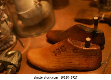 Antique Cobbler Shoe Molds Sit For Sale On A Table Waiting For A Collector.