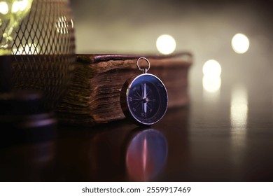 Antique Compass on Wooden Table Near Stacked Ancient Books with Soft Bokeh Lighting - Powered by Shutterstock