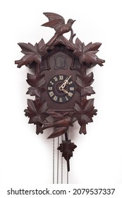 Antique Cuckoo Clock On White Background