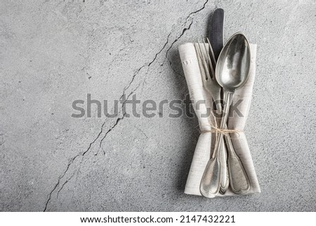 Antique cutlery on the table. Vintage cutlery.