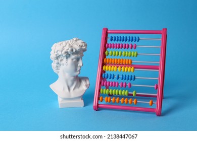 Antique David Bust With Abacus On Blue Background. Conceptual Pop. Minimal Still Life. Creative Idea