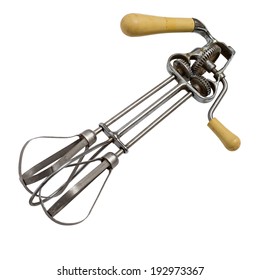 Antique Egg Beater On A White Background