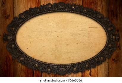 The antique frame with blank paper on knotty wood wall - Shutterstock ID 76668886