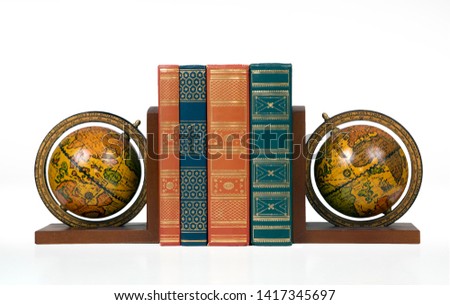 antique globe bookends with books-isolated white background