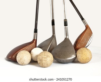 Antique Golf Balls And Old  Clubs