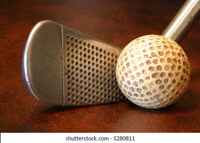 Antique Golf Club And Ball