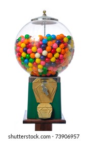 An Antique Gum Ball Machine Isolated On White.