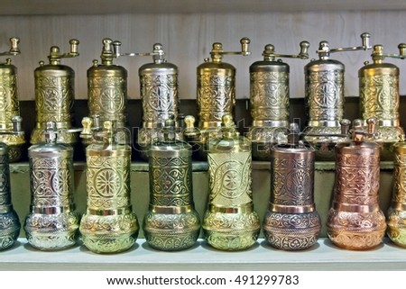 Antique hand coffee and spice grinders (mills) on bazaar in Istanbul