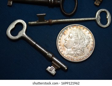 Antique keys and a silver dollar