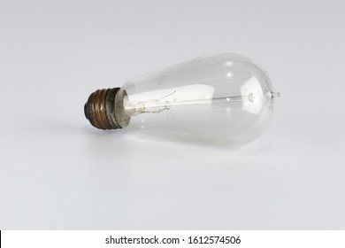 Antique Light Bulb On White Background