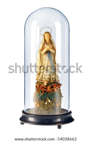 An antique maria figure from the holy bible made of wax, under bell-glass, on isolated white background