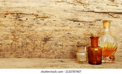 Antique Medicine Bottles, Victorian Era, On A Original 1800s Wooden Background With Space For Your Text Or Design