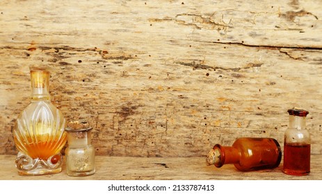 Antique Medicine Bottles, Victorian Era, On A Original 1800s Wooden Background With Space For Your Text Or Design