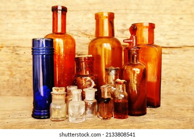 Antique Medicine Bottles, Victorian Era, On A Original 1800s Wooden Background