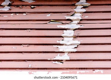 Antique Metal Roof Damaged By Weather