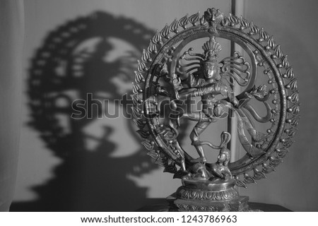 An antique metal sculpture of the dancing god Shiva also known as the Natraj or Natraja, woshipped by dancers following traditional danceforms of India.