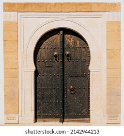 Antique, old, Arabic style door, entrance to a historic building.
