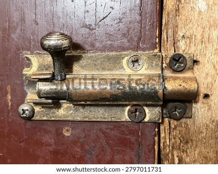 Antique Old Latch Lock.
An antique old latch lock features a timeless design, aged metal finish, and classic craftsmanship that reflects the charm of a bygone era.