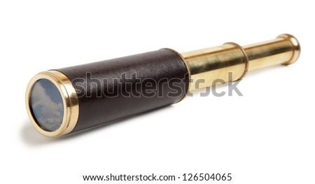 Antique old spyglass, isolated on white.