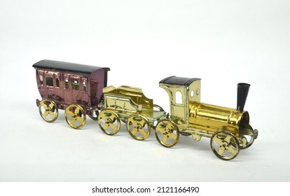 An Antique Penny Toy Toy Train C1890 On Plain White Background