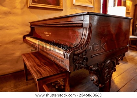 Antique piano in a great room
