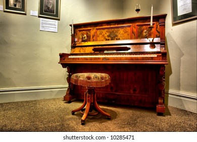 Antique Piano In Museum - Dramatic Light. Shot In Stellenbosch, Western Cape, South Africa.