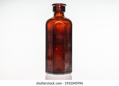 Antique poison or medicine bottles on white background