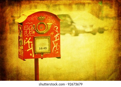 antique postbox in Brussels with antique style texture