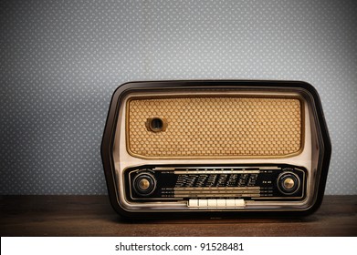 antique radio on vintage background